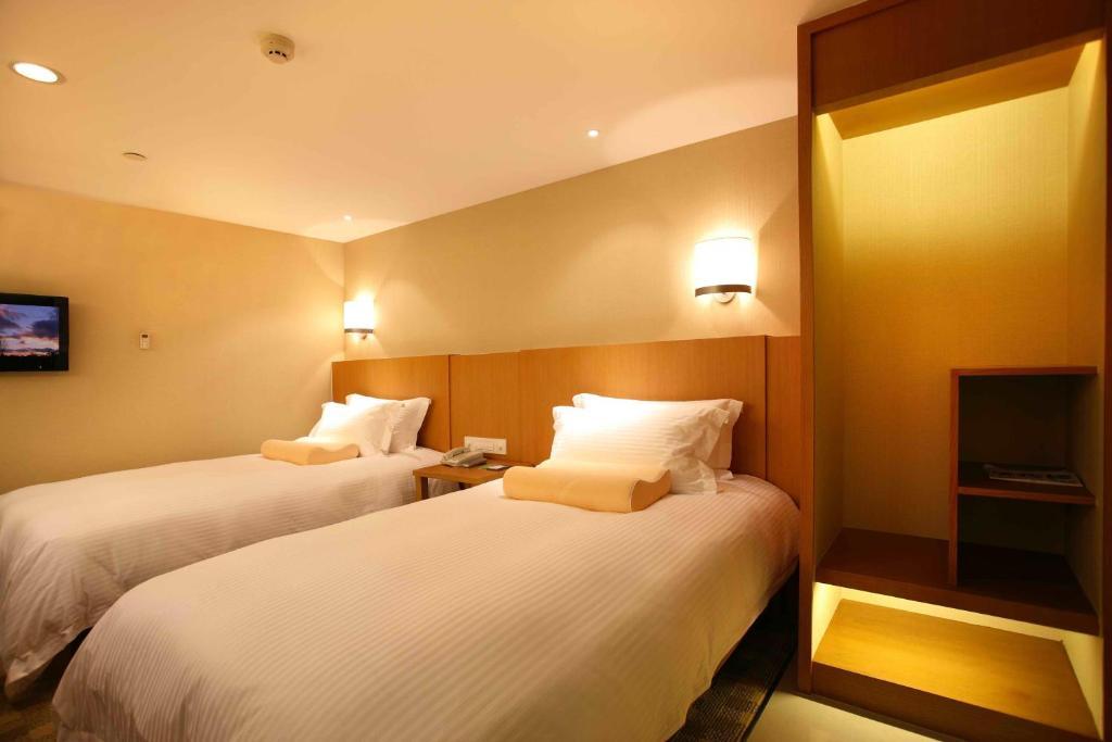 L'Otel Shanghai Rum bild